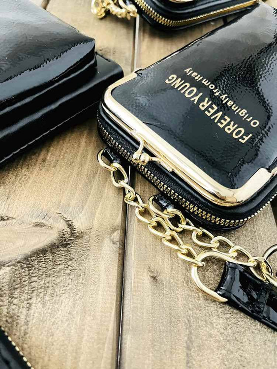 کیف جاموبایلی اسپرت دهنهدار ورنی براق مدل ماندلی